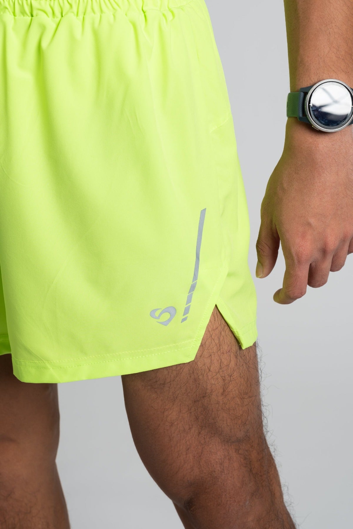Men's lime green running shorts, reflective logo