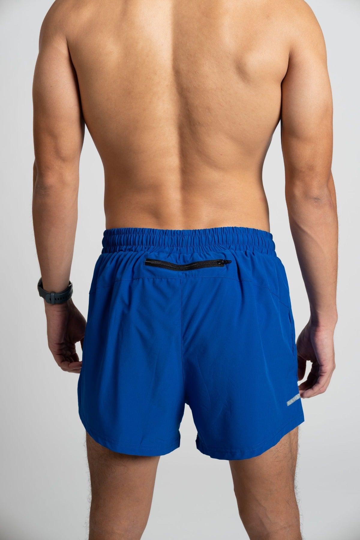 Men's blue running shorts, back zip pocket